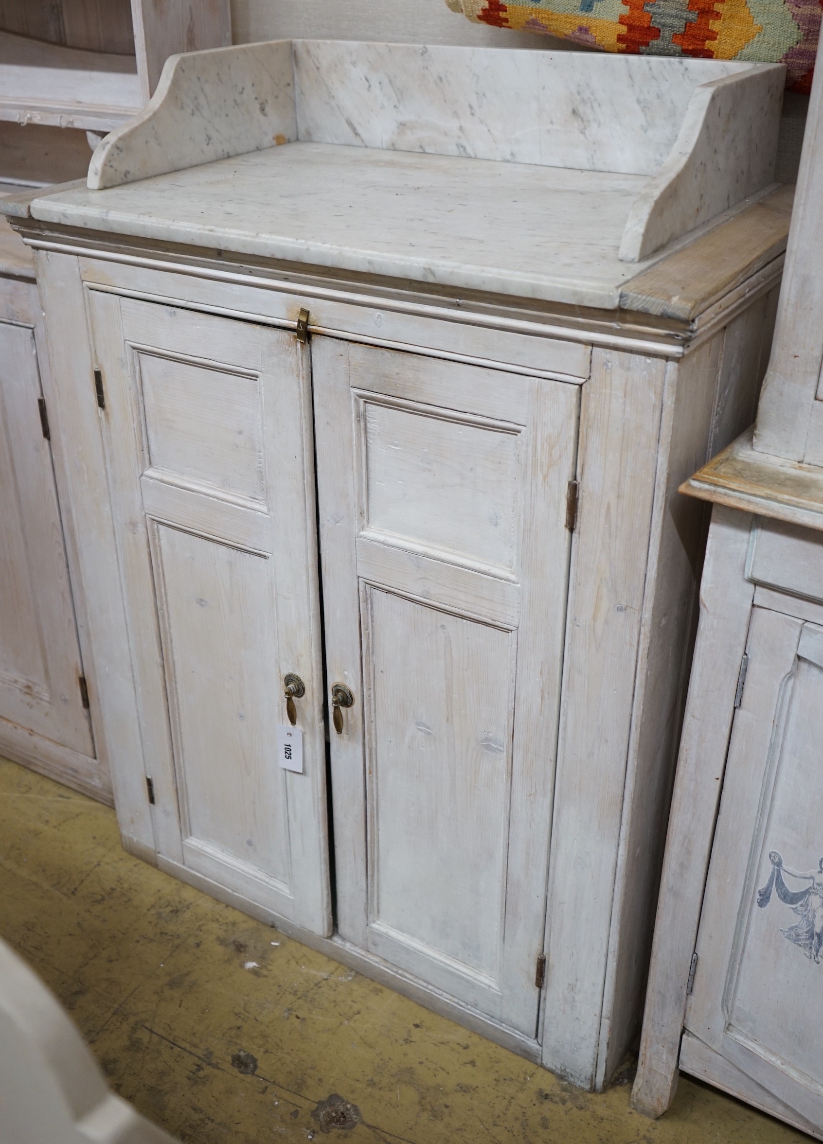 A Victorian painted pine marble top two door kitchen cabinet, width 89cm, depth 50cm, height 107cm